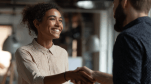 A person offering assistance to a colleague
