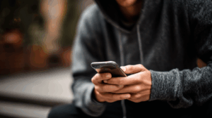 A person sending a text message