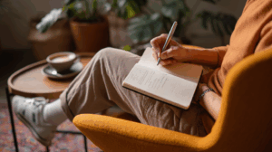 A person reflecting on their completed grammar exercises, smiling as they review notes