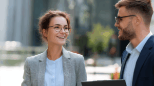 A young professional talking with their colleague