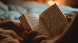 A person reading a book and highlighting sentences