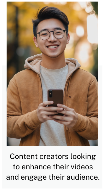 an asian man holding his phone